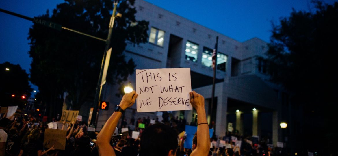 protesters-holding-signs-4552838